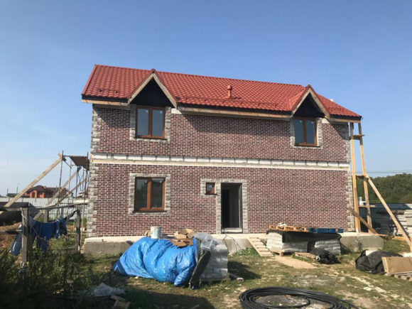 Отделка фасада декоративным кирпичом 220м2